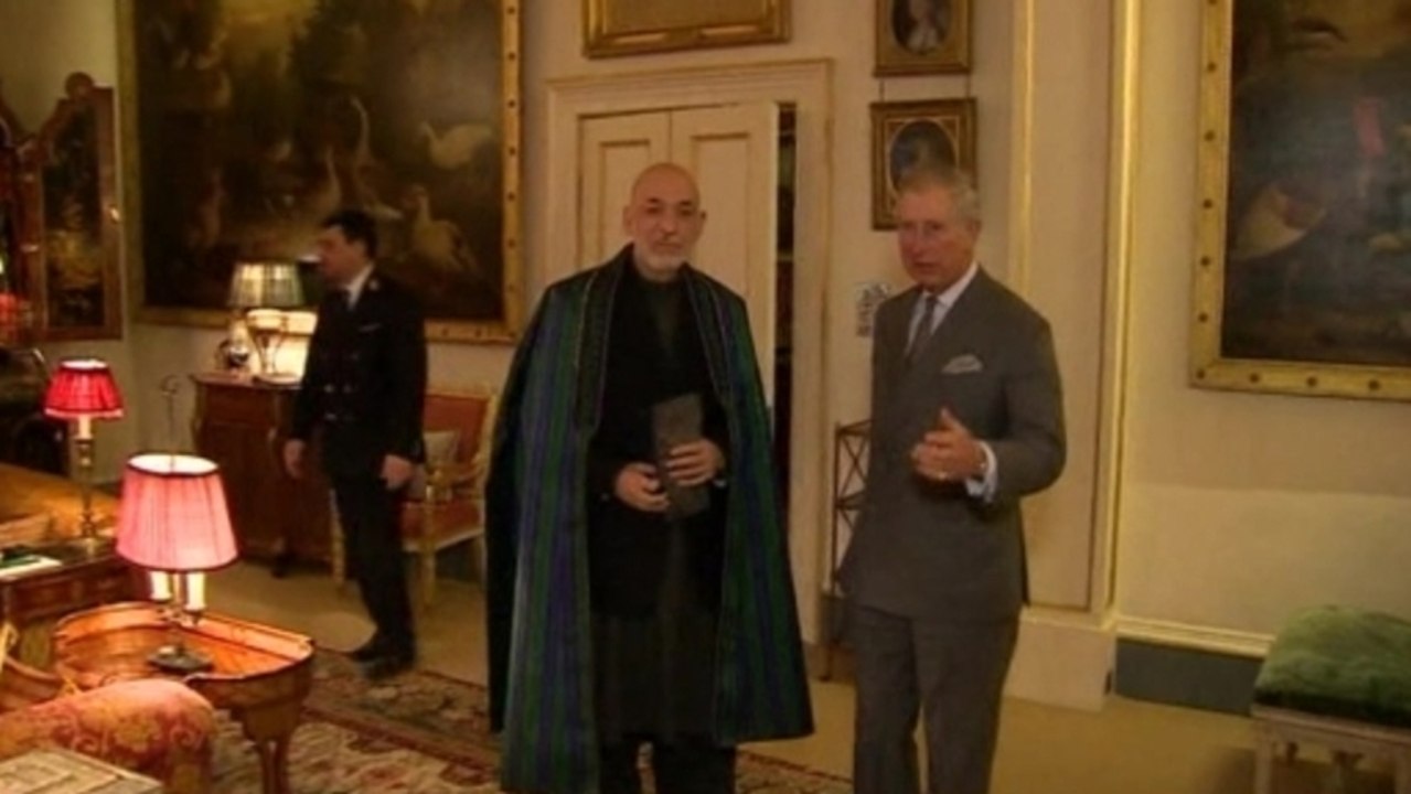 Afghan President Karzai meets Britain's Prince...