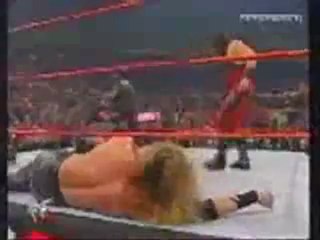 kane saves undertaker and the rock