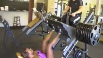 Woman leg presses over 1,000 with guy along for the ride