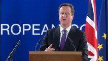 David Cameron hails EU budget cut