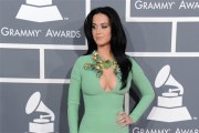 Rihanna Nips Out While Katy Perry Dons Chest-Baring Gown at the Grammys