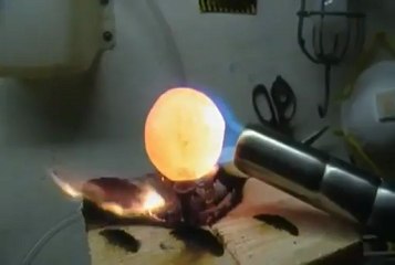 Red Hot Nickel Ball On Ice