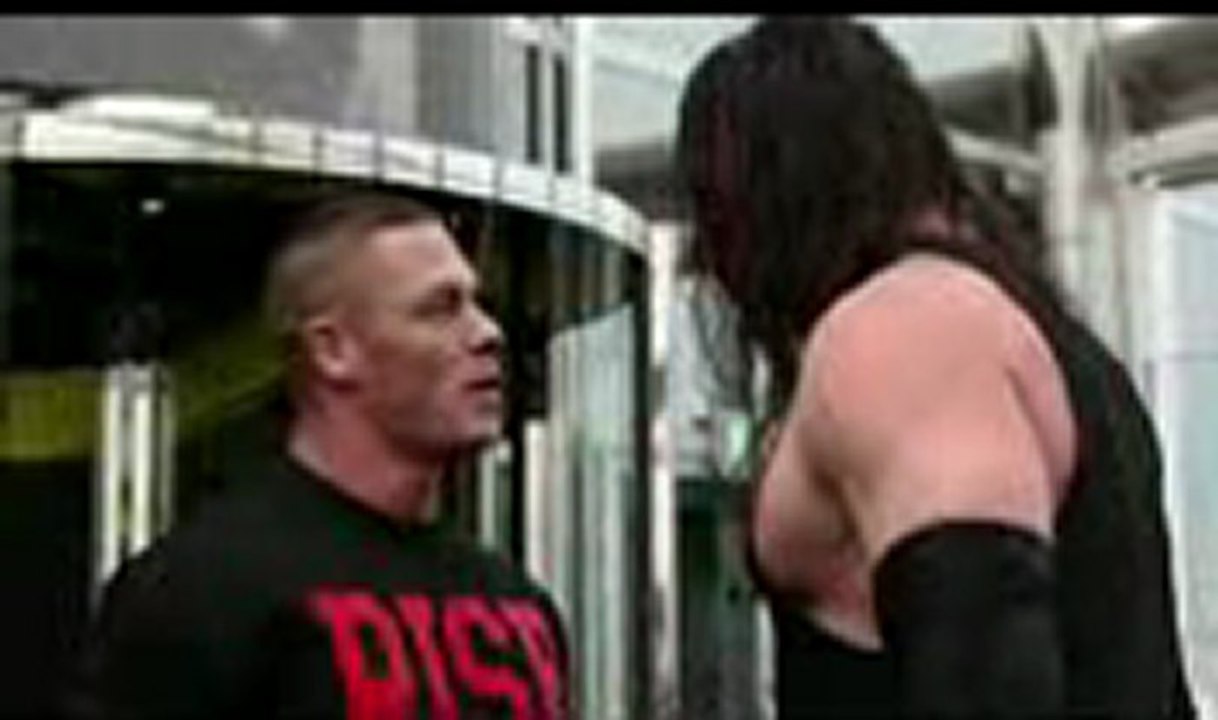 WWE superstar John Cena performs Attitude Adjustment on Kane at top of Burj Khalifa