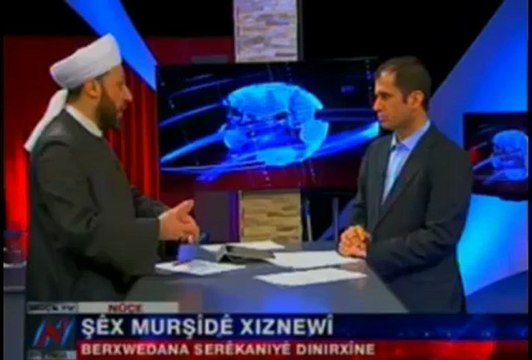 Şêx Murşîdê Xiznewî li ser êrîşên ser SerêKaniyê û pevçûnan fikr û şîroveyên xwe ên Kurdistanî tîne zimên. Nûçe tv.19ê 01a 13an.-20130119-221010_446