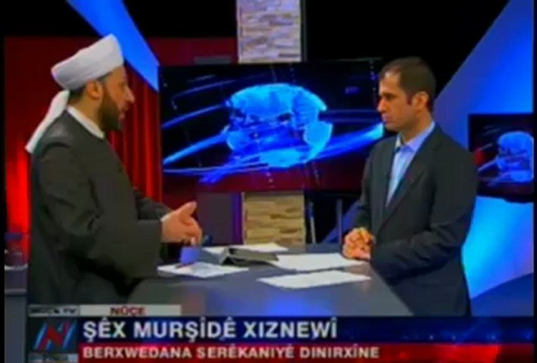 Şêx  Murşîdê Xiznewî li ser êrîşên ser SerêKaniyê û pevçûnan fikr û şîroveyên xwe ên Kurdistanî tîne zimên. Nûçe tv.19ê 01a 13an.-20130119-221010_446