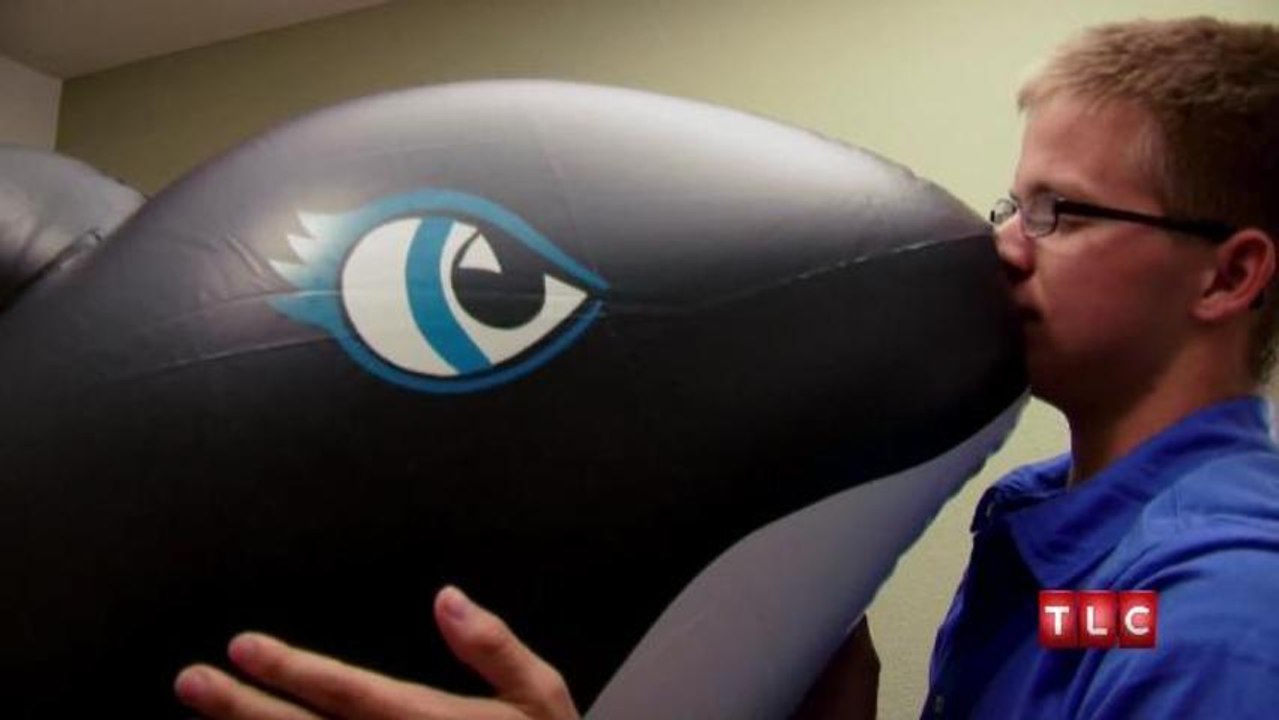 Man In Relationship With Inflatable Animals