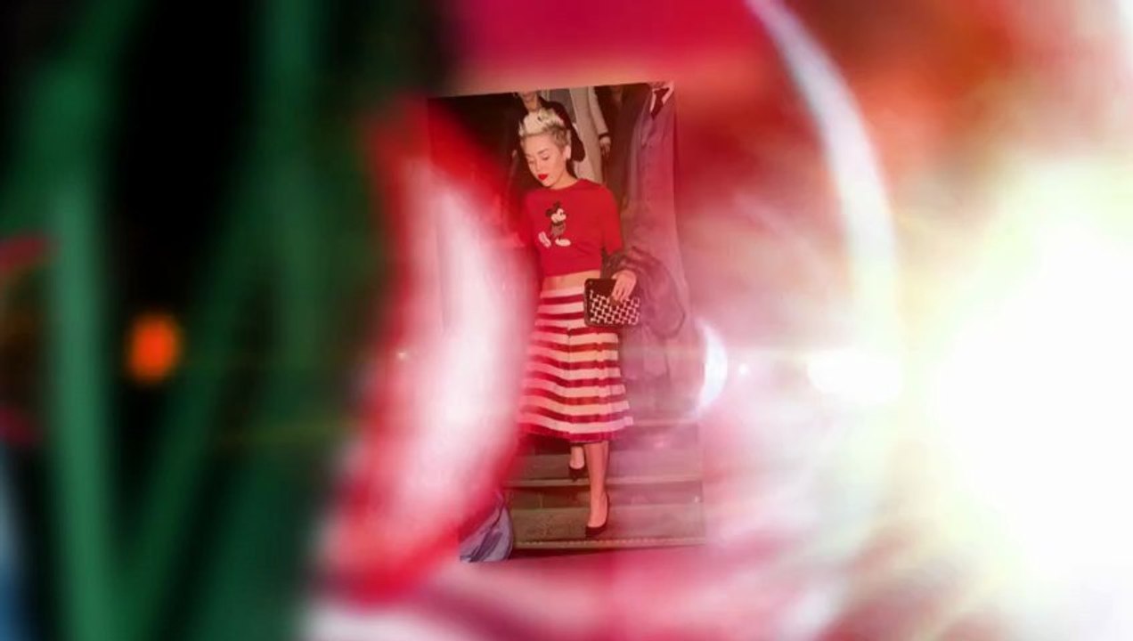 Miley Cyrus Shows Of Her Toned Tummy as She Takes the Mickey