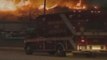 Raw: 200 vehicles burned in Ind. warehouse Fire