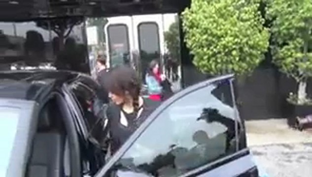 Kim K Covers Baby Bump in Odd Dress