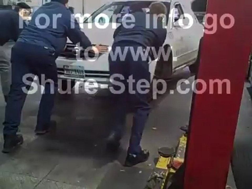 Using a Mechanics Step Stool to Move a 3 Wheeled Car in a Shop