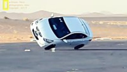 Changing a Tire While Driving on Two Wheels