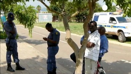 Pistorius officer on attempted murder charges