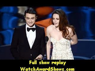 Télécharger la video: 85th Oscars Actor Daniel Radcliffe and actress Kristen Stewart present onstage Oscars 2013