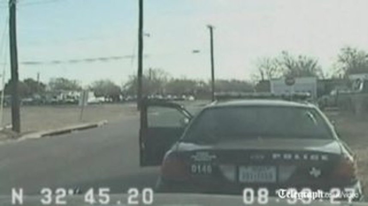 Handcuffed suspect steals police car in US