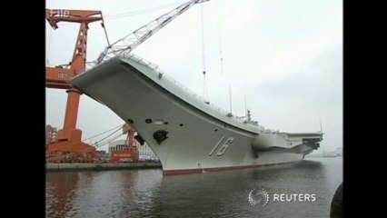 China's first aircraft carrier docks