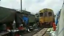 Bangkok Train Through Slums