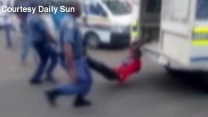 Man dragged by S.Africa police vehicle dies in detention