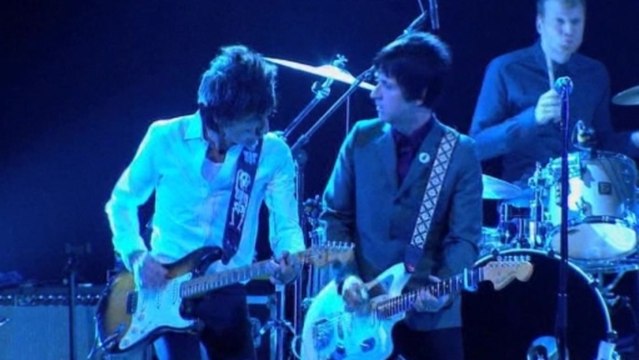 Stones scoop two NME Awards as Ronnie Wood joins Johnny Marr on stage