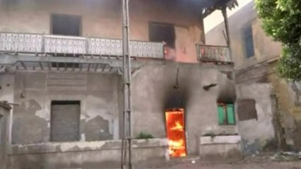 Violence rages as protesters burn police station in Egypt