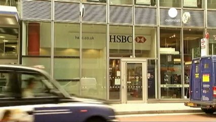 HSBC to lift dividend though 2012 profits dip