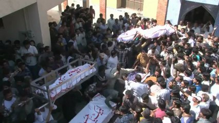 Thousands bury Karachi victims, toll rises to 48