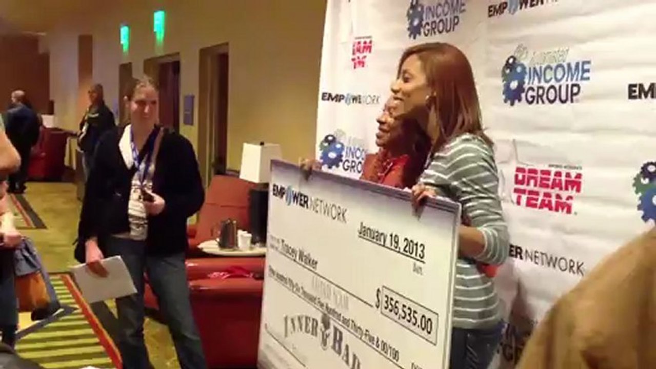Tracey Walker mingles with the crowd and showed off her huge check at Austin Texas Badass Event.