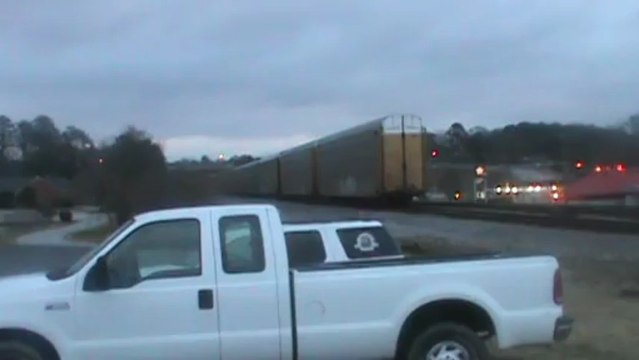 Norfolk Southern stack and autorack train southeast through Austell Ga.