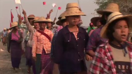 Myanmar's Suu Kyi defends protest-hit mine
