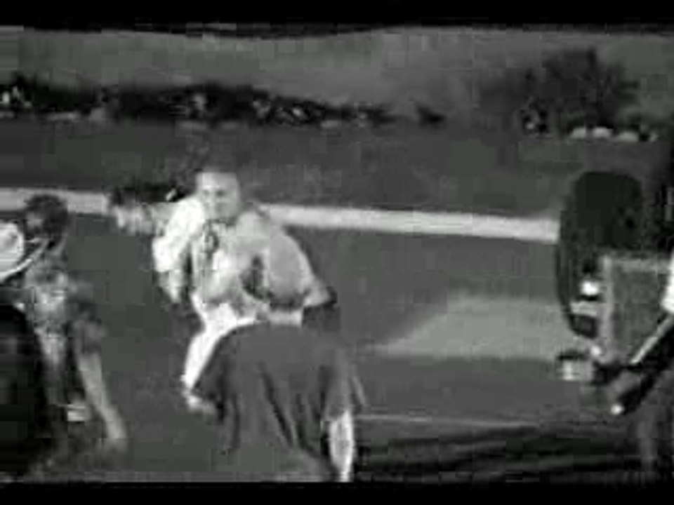 Some guy beating up 3 guys