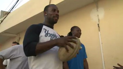 NFL stars visit Senegalese child mine workers