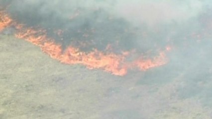 Wildfires rip through mile-high state