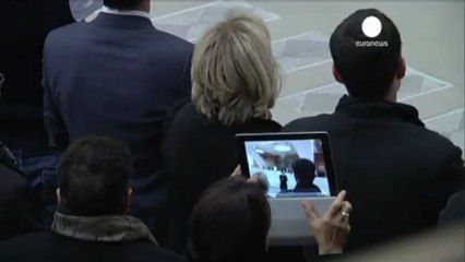 Pope charms journalists in first media test