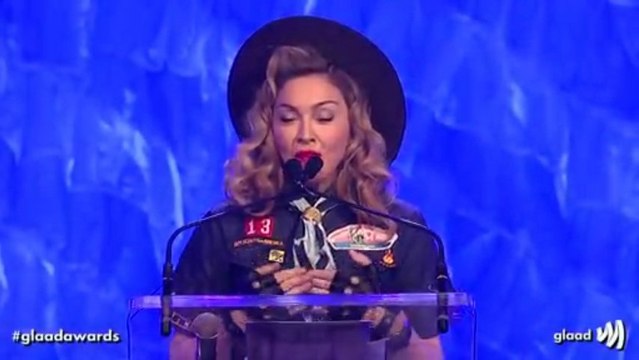 Anderson Cooper receives the Vito Russo Award from Madonna at GLAAD Media Awards