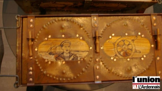 Où se trouvent les bouteilles de champagne avant la vente aux enchères?