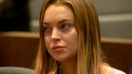 Lohan gets new mug shot; Perry, Mayer split
