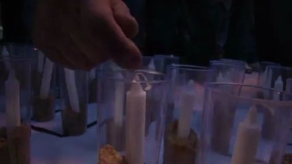 Palestinians light candles in protest over Obama visit