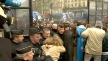 Anti-gay marriage demonstrators scuffle with police