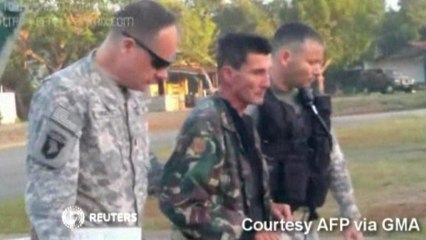 Family of freed Australian abductee demands justice