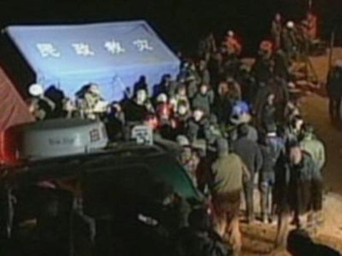 Raw: Landslide buries dozens in China