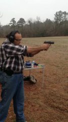 Shooting with pistol.