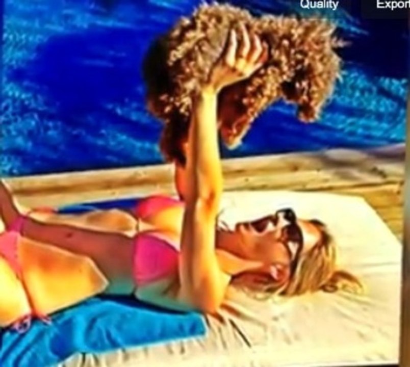 Bar Refaeli Wows in a Pink Bikini While Cuddling Her Dog