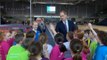 Prince William teaches kids to high-five as Kate dons tartan for Scottish visit