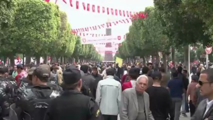 Tunisia Islamists, opposition mark tense 'Martyrs Day'