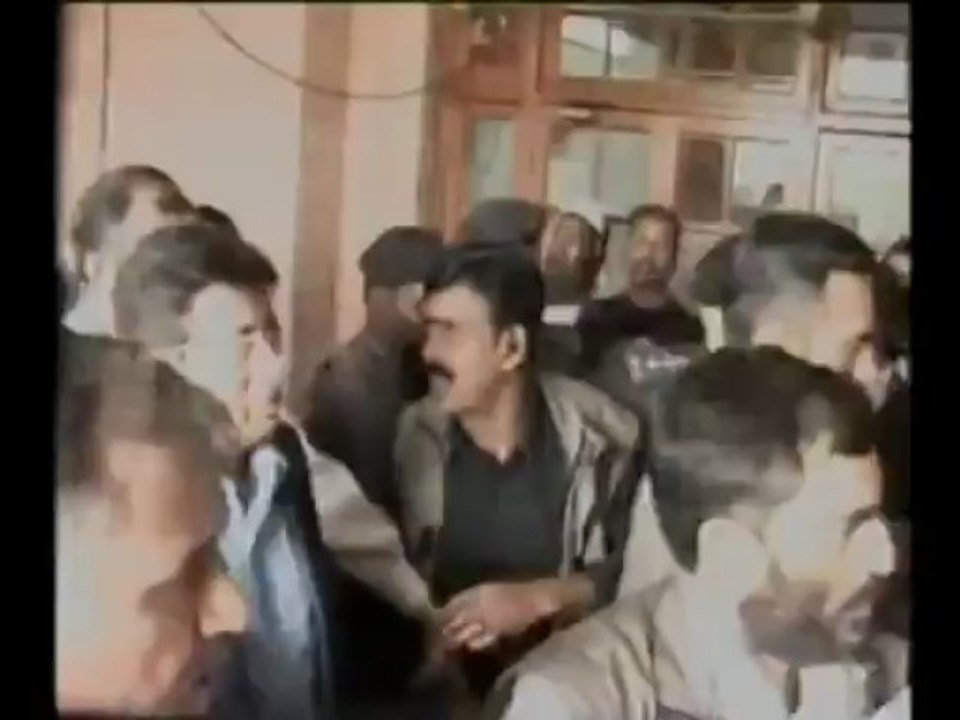 A man throws shoe on Musharraf