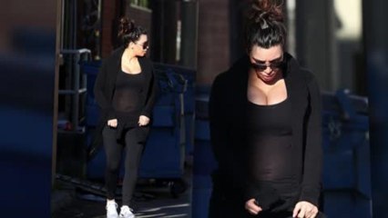 Kim Kardashian Bares Baby Bump in Sheer Top