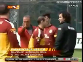 Eboue and Sneijder in training