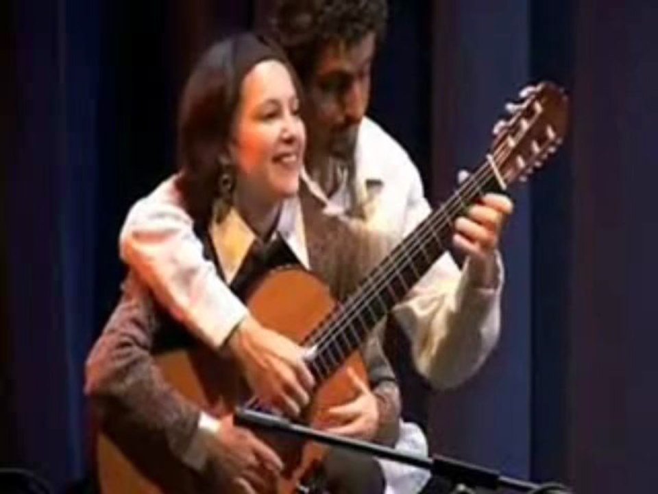 Guitare à quatre mains