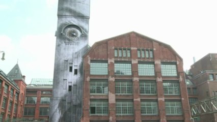 French graffiti artist JR at work in Berlin