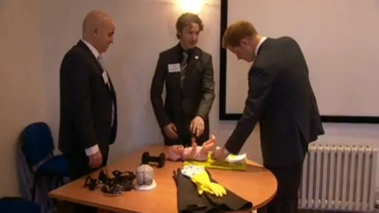 Prince Harry changes nappy and boxes during charity visit