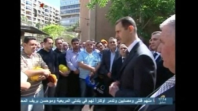 Assad urges his supporters to remain fearless